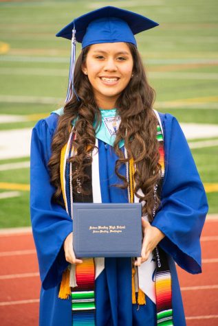 Alyssa Lecca recieves her diploma June 4, 2020 at Sedro-Woolley High School.