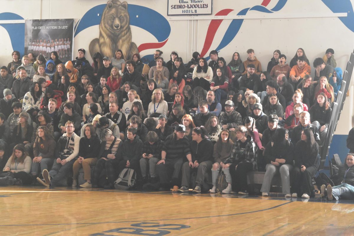 High schoolers watch William Winfield give his motivational speech at the MLK assembly  on January 16