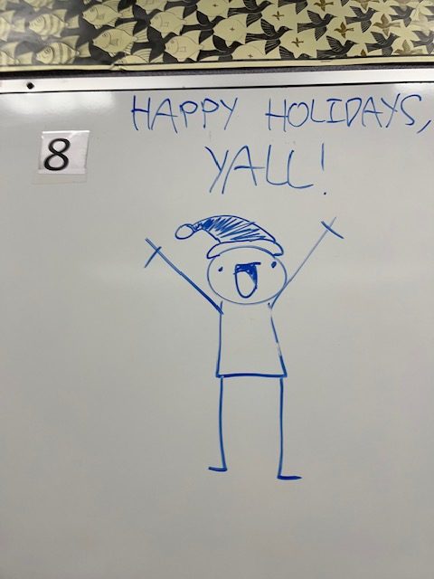 A silly drawing in Mr. Cornelius room wishing everyone a Merry Christmas