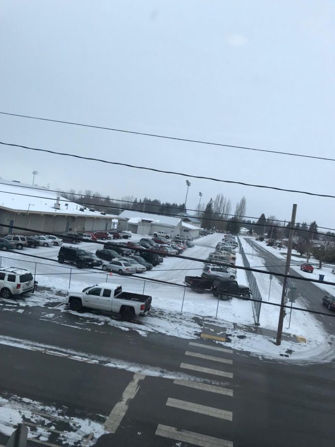 The “back 40” parking lot is full enough without a blanket of snow and  ice claim SWHS students. Photo by Madisun Tobisch.