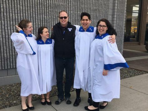 Sedro-Woolley High School seniors and vocal arts director Poul Brask stand outside the Yakima Convention Center after their concert February 16. These seniors qualified for the honor of the All-State choir in late November. 
Photo courtesy of Serina Wilson