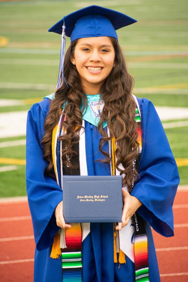 Alyssa Lecca recieves her diploma June 4, 2020 at Sedro-Woolley High School.