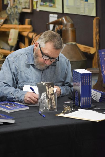 Mike Stewart signing books at the Sedro-Woolley Museum 