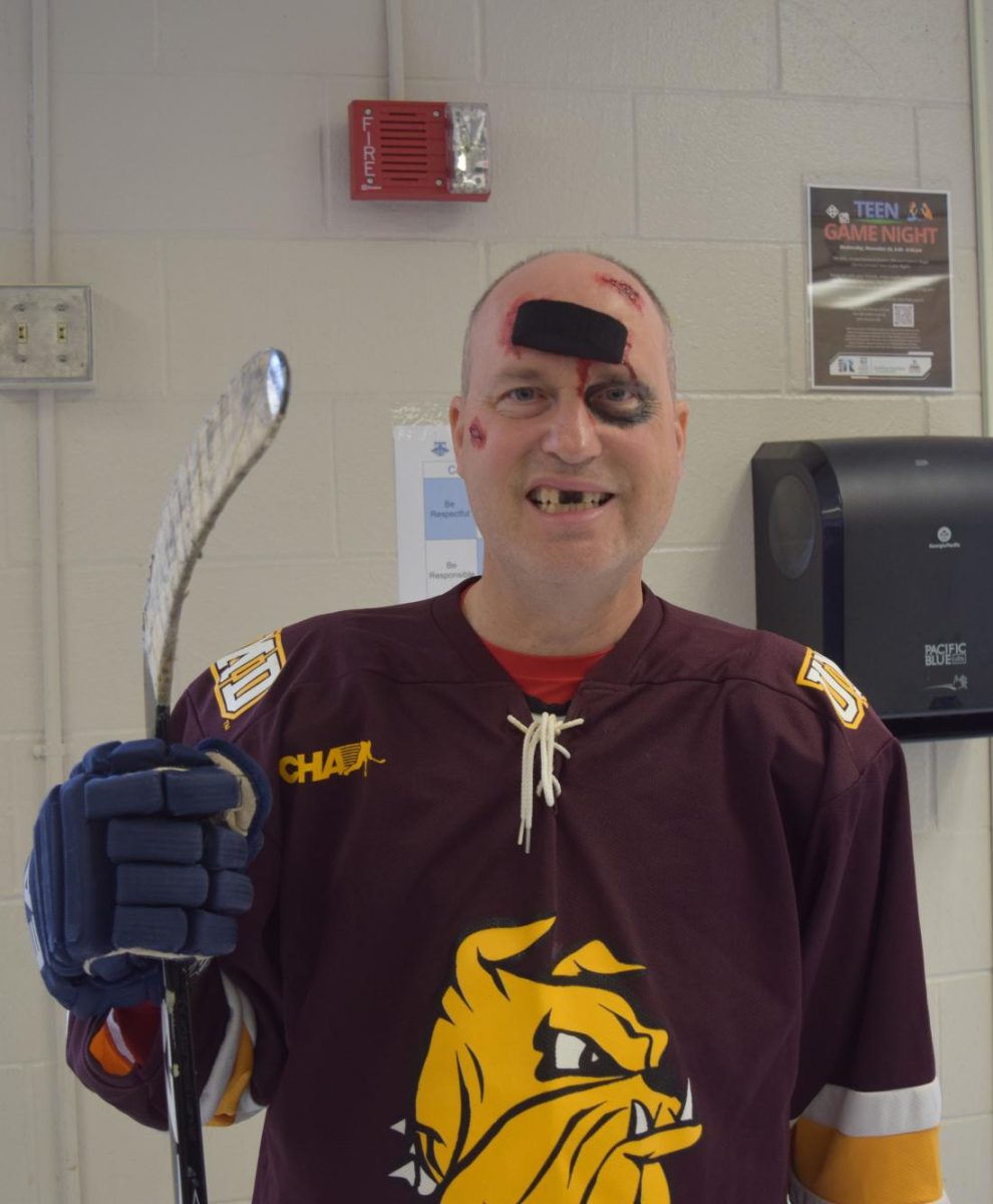 French teacher Robert Slabodnik dresses as a "injured hockey player" on Halloween, 2024.