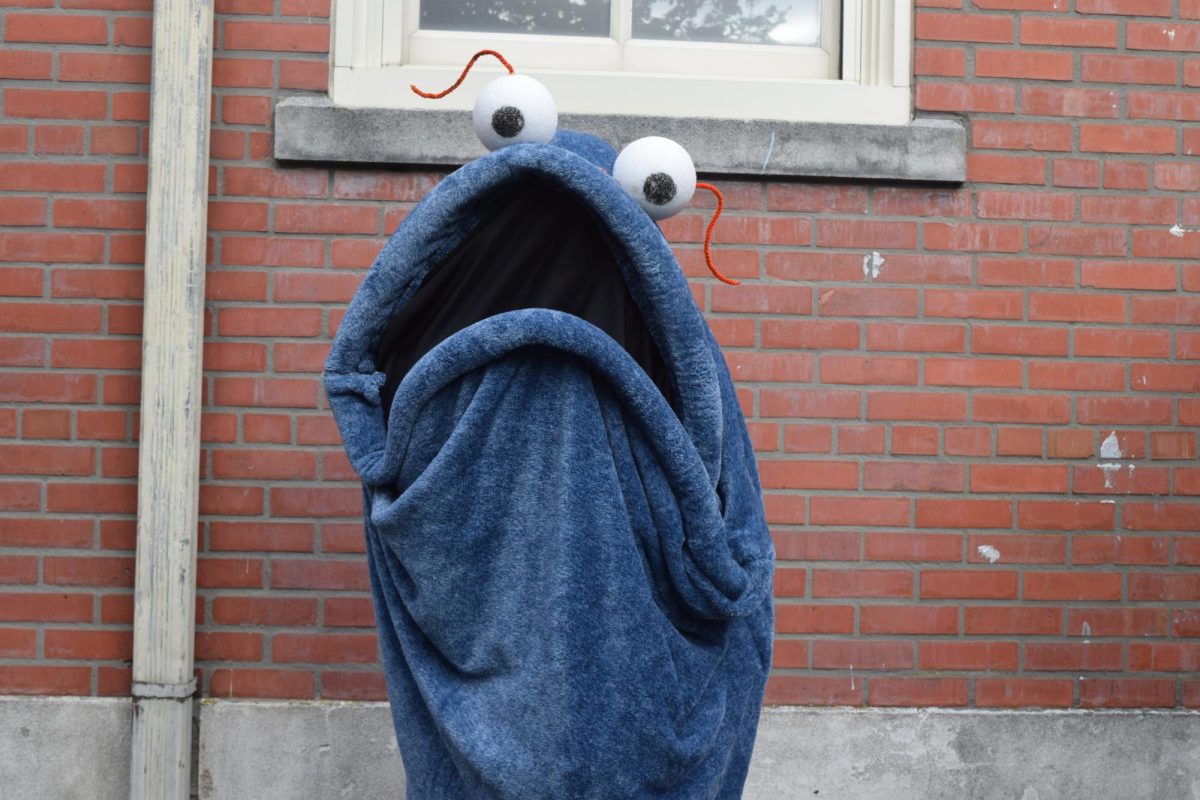 Junior Xander Barnett dresses as a "Yip Yip" on Halloween, 2024. 