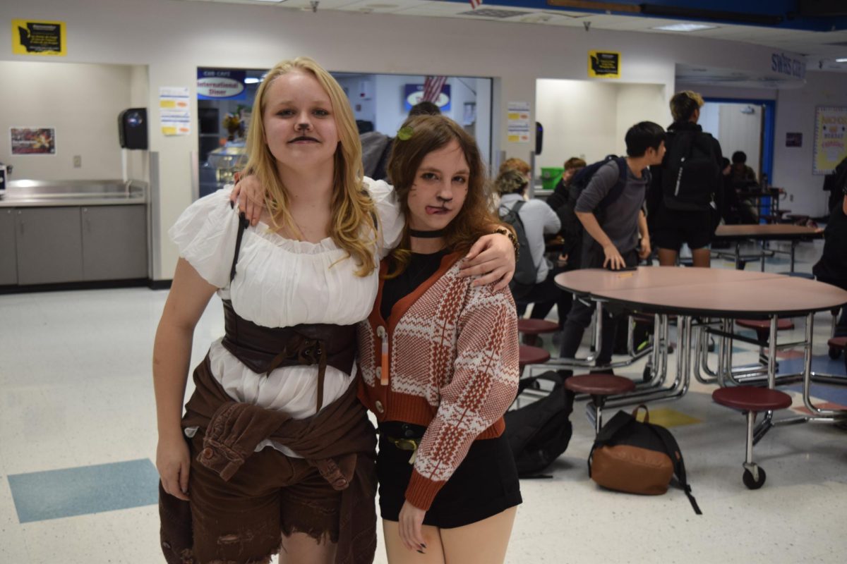 sophomore Emily Hill and Freshman Krykett Clark dresses as "the fox and the hound" on Halloween, 2024. 